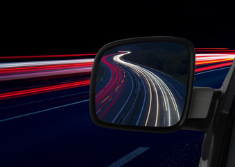 car lights and rear-view mirror