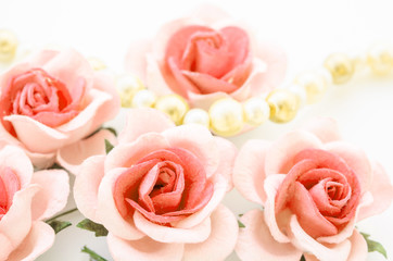 Red rose with pearls.