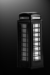 
Traditional telephone booth in London on grey background