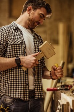 Carpenter working in workshop