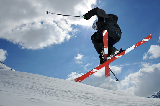 Ski jumper with crossed skis