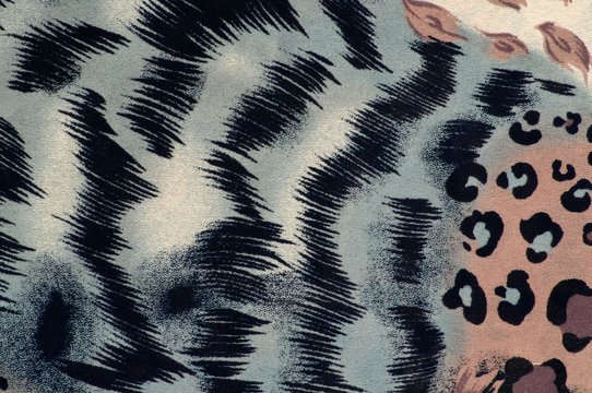 Colourful fabric with animal print background close up