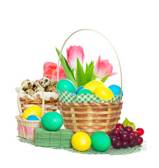 bouquet of tulips and a basket with eggs