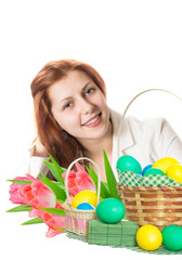 pretty girl and a basket with eggs