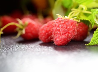 raspberries in a wooden bowl