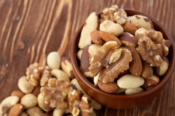 Mix nuts  on wooden background