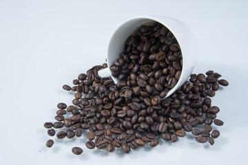 Coffee cup with coffee beans