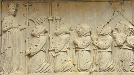 Fototapeta na wymiar Roman sculpture of Saint Fosca preaching in marble