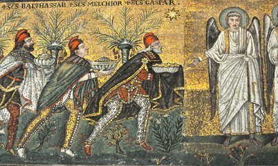 Ancient byzantine mosaic of three magi offering gifts to an angel