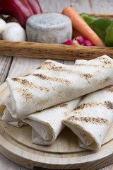 tortilla wraps with meat and vegetables