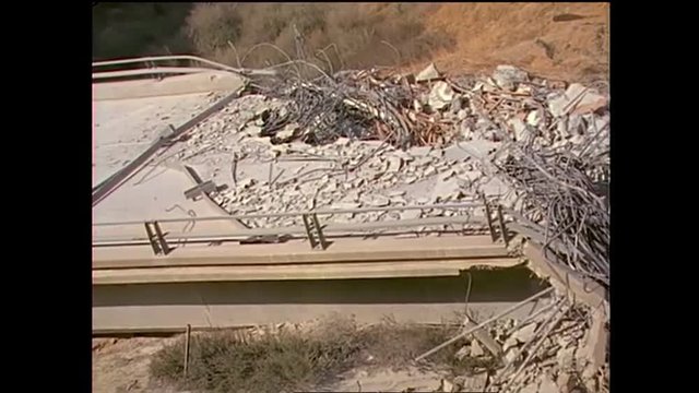 Footage of the 1994 Northridge earthquake freeway collapses.