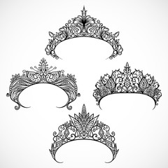 Collection of tiaras. Vintage hand drawn black and white vector illustration. © kateja
