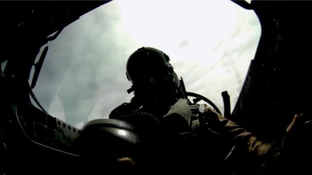 POV shots from the cockpit of a fighter plane.