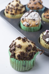 Chocolate Muffins with Sugar Icing. Isolated with clipping path.