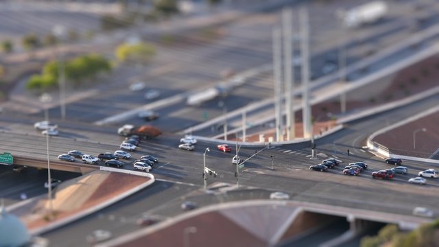 LAS VEGAS, Circa April, 2015 - A high-angle tilt shift time lapse view of busy Interstate 15 near Las Vegas.	