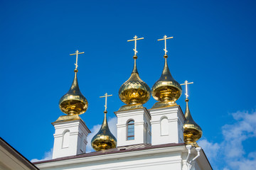 Fototapeta na wymiar Golden domes of Dormition Cathedral in the city of Ivanovo, Russ