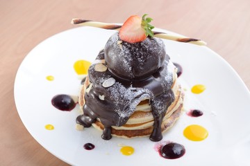 Pancakes with ice cream on top