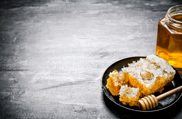 Fresh honey comb in an old pan.