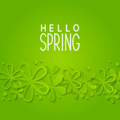 Paper flowers on green background 