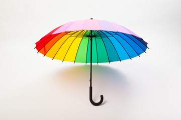 multicolored umbrella on white background