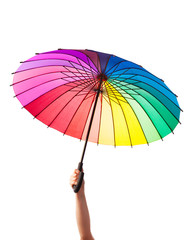 hand holding multicolored umbrella, isolated on white