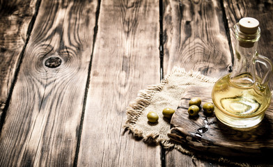 Olive oil on wooden Board