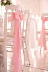 chairs decorated for wedding