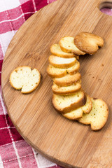 Saulty crispy little toast breads on the wooden board