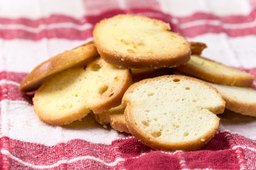 Crispy toast breads with cheese in macro view