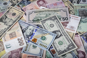 A collection of various foreign currencies from countries spanning the globe. 