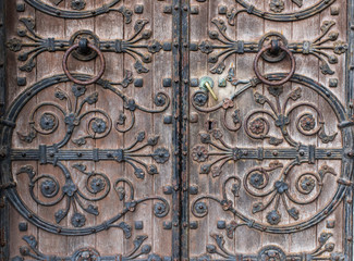 close up detail of old church door design in Cork city Ireland 