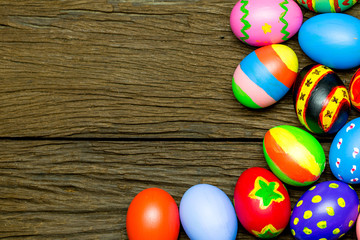 Fototapeta na wymiar Easter eggs on wood background