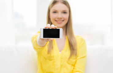 close up of woman showing smartphone blank screen