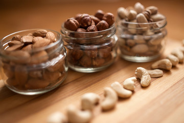 Almonds, walnuts and hazelnuts in glass jar
