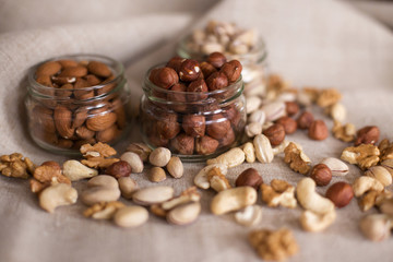 Almonds, walnuts and hazelnuts in glass jar