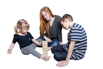 Mama and two kids play together on white background