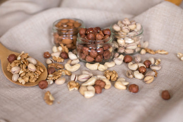Almonds, walnuts and hazelnuts in glass jar