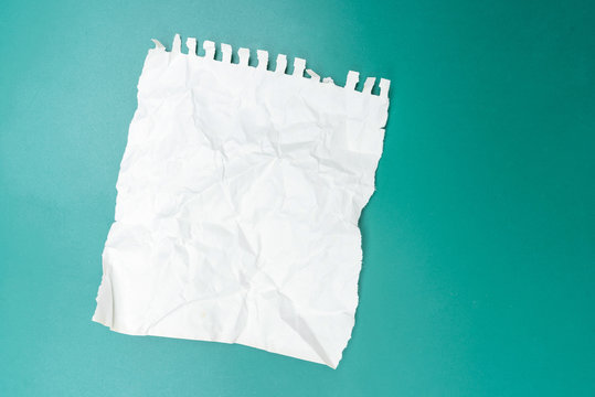 Crumpled paper with green background