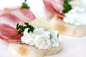 Canapes with ham and cream cheese