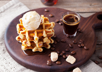 Fresh whole wheat waffles, ice cream, maple syrup
