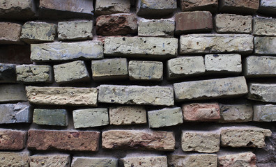 Background of old vintage color brick wall
