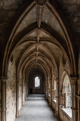 Fototapeta na wymiar Evora, Portugal - December, 2015: Cloister of the Evora Cathedral, the largest cathedral in Portugal. Romanesque and Gothic architecture. UNESCO World Heritage Site.