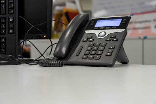 voice over IP Phone on white desk