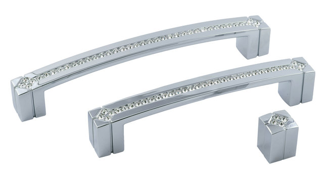 classic furniture handles with rhinestones under the silver on a white background