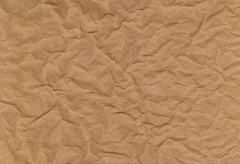 Texture of crumpled brown paper for pattern background