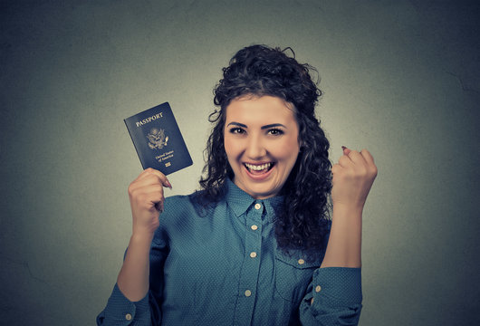 young excited woman with USA passport