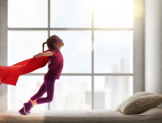 girl in an Superman's costume