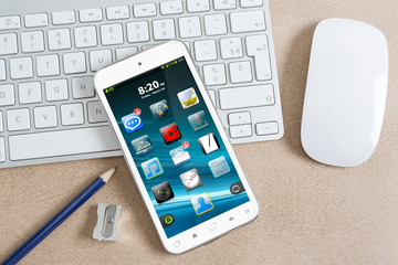 Workplace with modern mobile phone