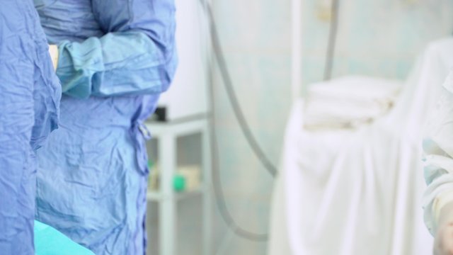 Surgeon working on the tibia in an arthritic knee