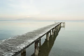 Foto auf Acrylglas Wooden dock at lake © matteosan